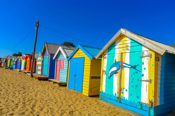 Fototapeta na wymiar colorful beach huts at the beach