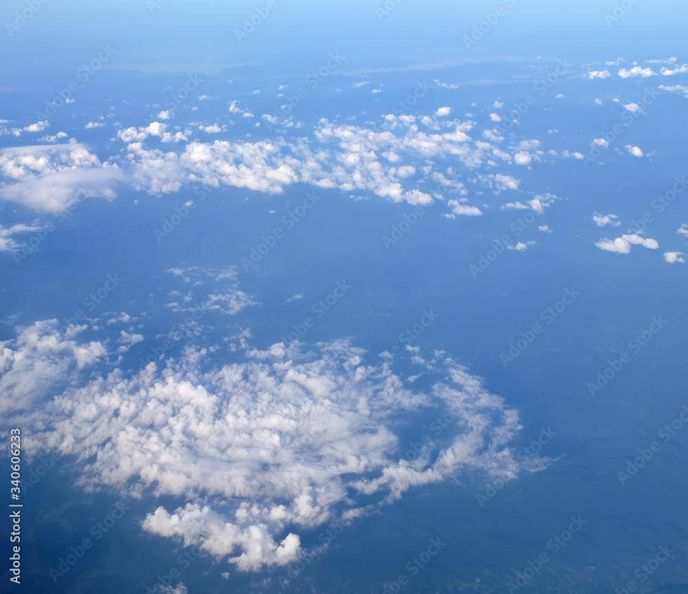 Wall mural Sky view from a high angle on the plane