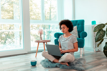 Female freelancer working remotely from home