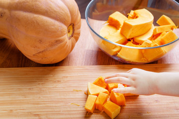 Orange pumpkin cut into pieces