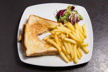Vegetable Sandwich . potato snacks . salad.