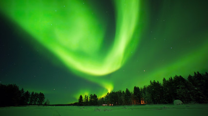 Aurora borealis. Northern lights night photo arctic circle