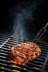 Beef steak on the grill - obrazy, fototapety, plakaty