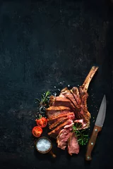 Rolgordijnen Grilled dry aged tomahawk beef steak sliced © Alexander Raths