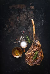 Gordijnen Grilled tomahawk beef steak with spices © Alexander Raths