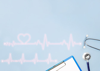 Double exposure of medical stethoscope and writing pad paper clip board isolated on light blue,...