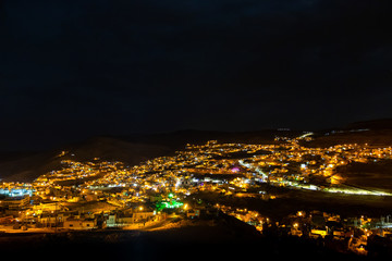 night panorama of town Wadi Musa, the closest town to the Petra, Jordan