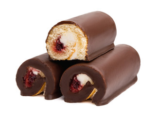 Chocolate cake roll with berry jam and butter cream isolated on white background