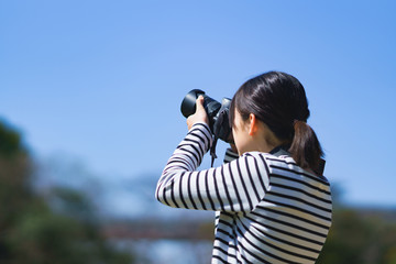 Japanese photographer shooting picture 