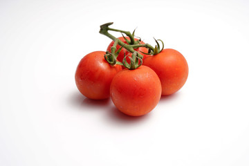 A fresh Cocktail Truss Tomatoes on white isolated background