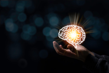 Hand holding creativity illustration electronic circuit brain. It is artificial intelligence and AI...