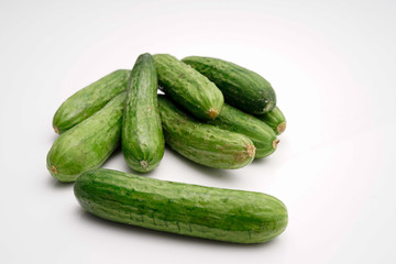 crunchy mini cucumber on white isolated background