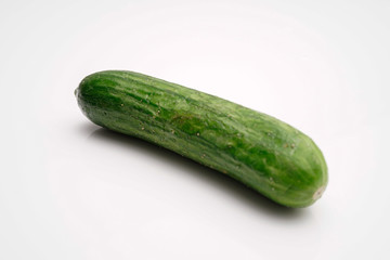 crunchy mini cucumber on white isolated background