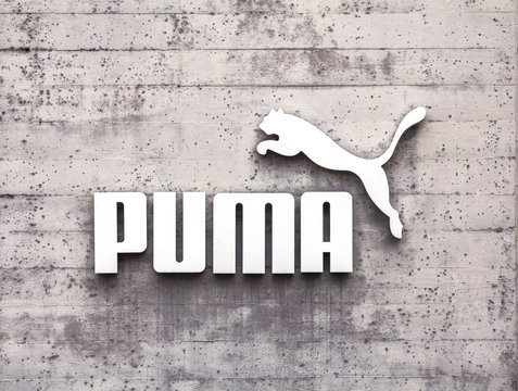 Herzogenaurach, Germany : Puma logo on a facade. Puma is a major german multinational company that produces athletic, casual footwear, sportswear, headquartered in Bavaria, Germany
