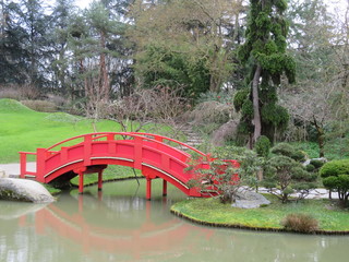 Beautiful Japanese garden in the city of Toulouse with lake and bridge