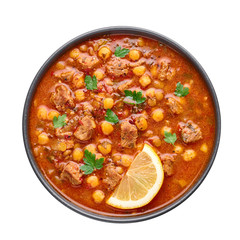 Moroccan Harira Soup in black bowl isolated on white bakcground. Harira is Moroccan Cuisine dish...