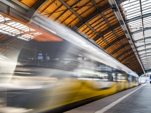 Train on the platform at main railway station in WROCŁAW - "DWORZEC GŁ&Oacute;WNY PKP", blurry train, 
long exposure, exposition