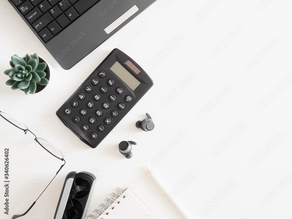 Aufkleber top view of work from home concept with keyboard, calculator and notebook on white background, graph