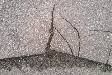 Obraz premium Cracked concrete and asphalt
