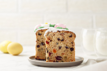 Slices of Easter cake with milk
