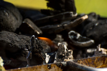 hot coals burning in the grill