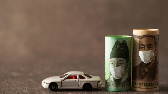 Korean won and Japanese yen wearing mask with white car