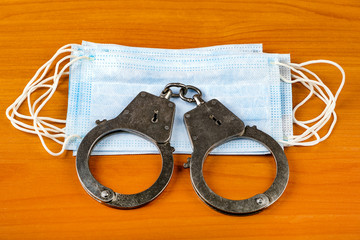Flu Masks and Handcuffs
