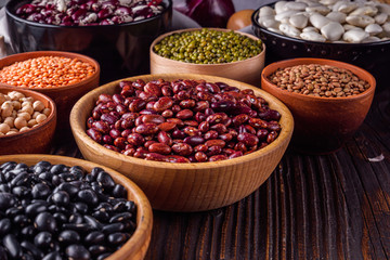 Fresh organic natural beans on wooden rustic background
