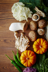 Various vegetable and mushroom on wooden background 
