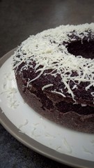 Black sticky rice cake with cheese topping