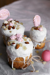 Easter cakes with nuts, Bizet, candied pineapple. Easter cakes rewound with craft rope.