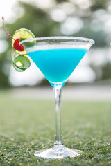 blue lagoon cocktail decorated with lime fresh cocktail with blue curacao or blue hawaiian alcohol 