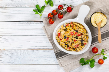 Cheesy Grilled Chicken Alfredo Pasta Florentine with Black Beans and Corn. Selective focus.