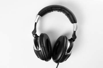 Fototapeta na wymiar gray headphones on a white background, music, sound