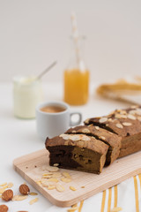 Home made banana bread for breakfast with coffee, juice and yoghurt