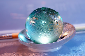 blue wet glass ball