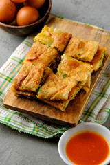 Martabak Telor or Martabak Telur. Savory pan-fried pastry stuffed with egg, meat and spices