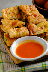 Martabak Telor or Martabak Telur. Savory pan-fried pastry stuffed with egg, meat and spices