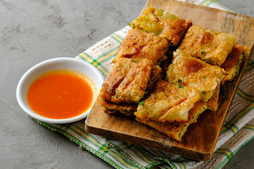 Martabak Telor or Martabak Telur. Savory pan-fried pastry stuffed with egg, meat and spices