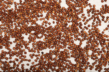 Grey peas on rustic tablecloth. Traditional Latvian food, Legumes bean seed. Overhead background.