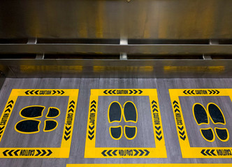 The position that stands in the lift to be safe from virus infection