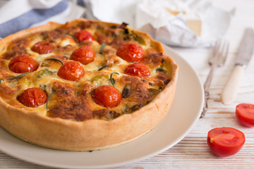 pie with  cheese brie and cherry tomatoes