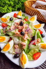 tuna salad on dark wooden rustic background