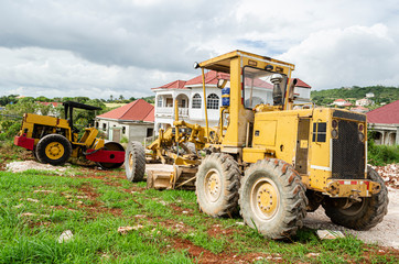 Obraz premium Parked Motor Grader And Road Roller