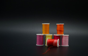 Miniture Spindles of colored cotton thread