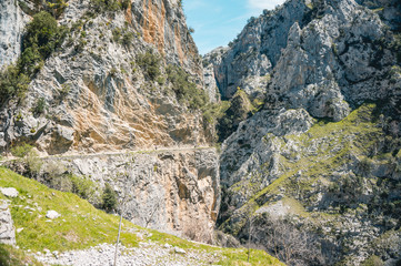 nice mountain road with cliffs, feeling of freedom and stunning views