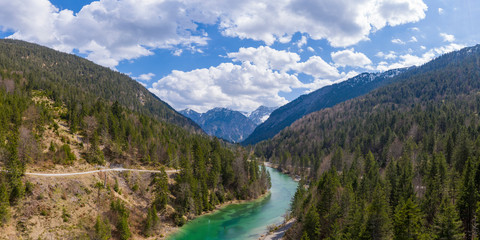 Fototapeta na wymiar aerial view to panorama of small lake plansee between tirol mountains in austria
