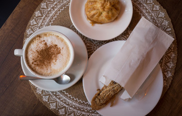 Georgia. Cappuccino with pastries