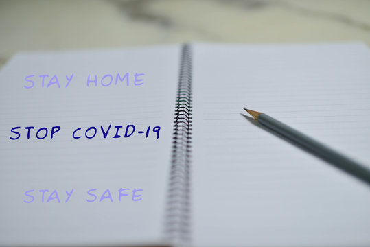 Picture of note book on how to protect yourself from corona virus, Covid-19
 ,The concept of prevention from coronavirus infection. Self-isolation and quarantine. COVID-19, Stop and staying safe.