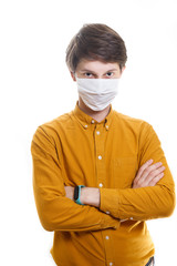 is time to protect all the time. elegant man wearing a mouth protection to prevent getting sick at work